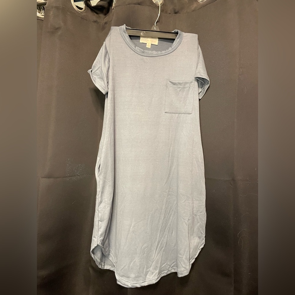 Children’s boutique dress. Multiple sizes available. In original packaging